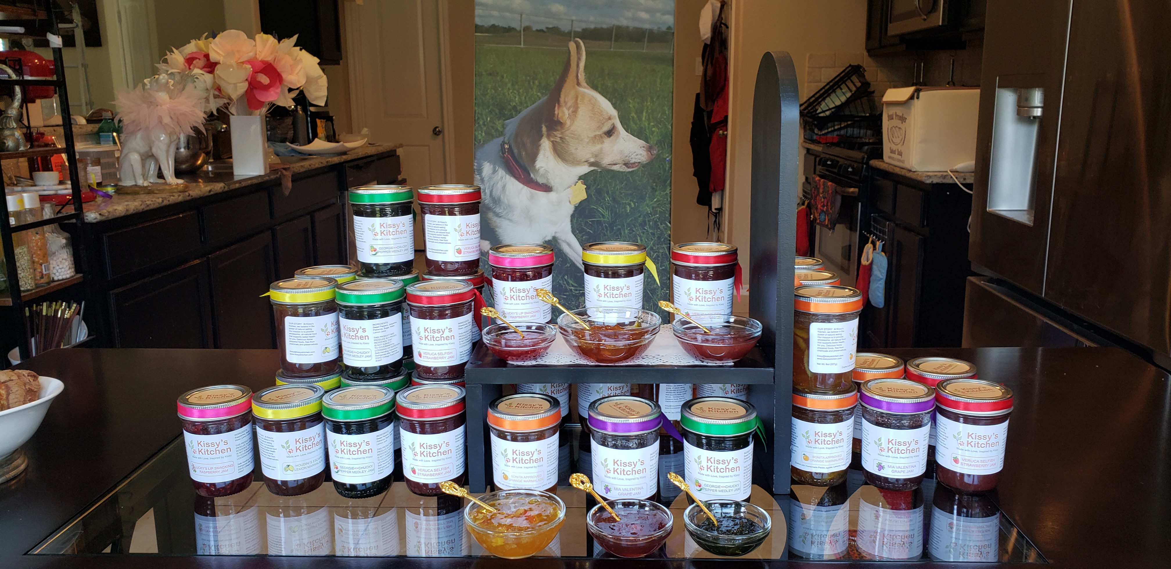 Rows of colorful homemade jams and marmalades
